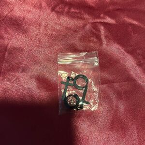 New black cross hoop earrings